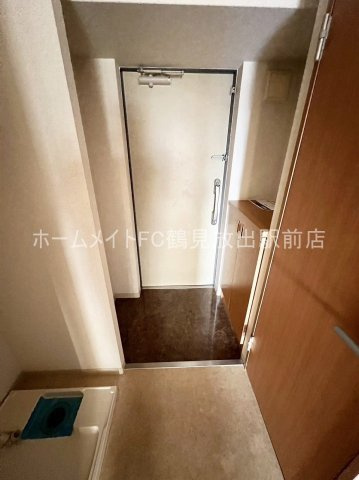 大阪市城東区今福東１丁目の賃貸マンションの玄関