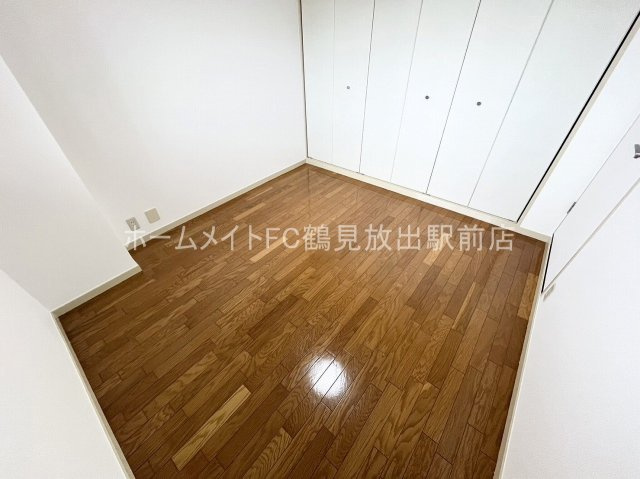 大阪市鶴見区諸口６丁目の賃貸マンションの洋室