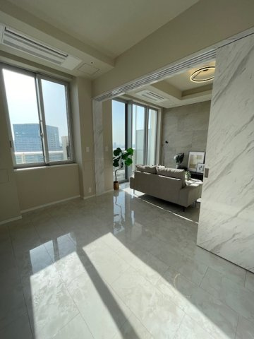 ザ・パークハウス晴海タワーズ ティアロレジデンスの洋室|7帖とリビングダイニングの間の可動扉を開けたところ