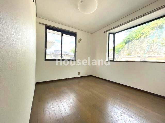 ホワイトハイツ西浜の洋室