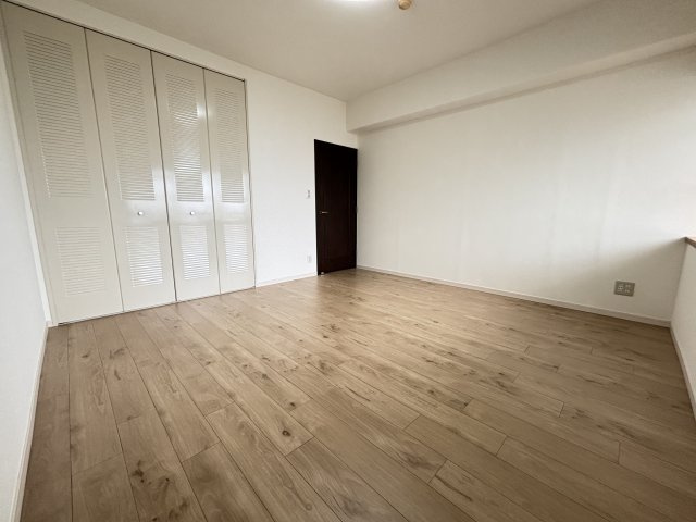 アバンドーネ西神春日台1号棟の洋室