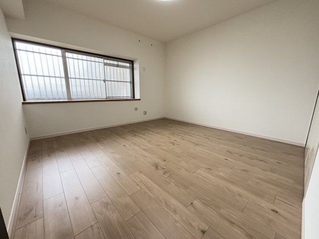 アバンドーネ西神春日台1号棟の洋室