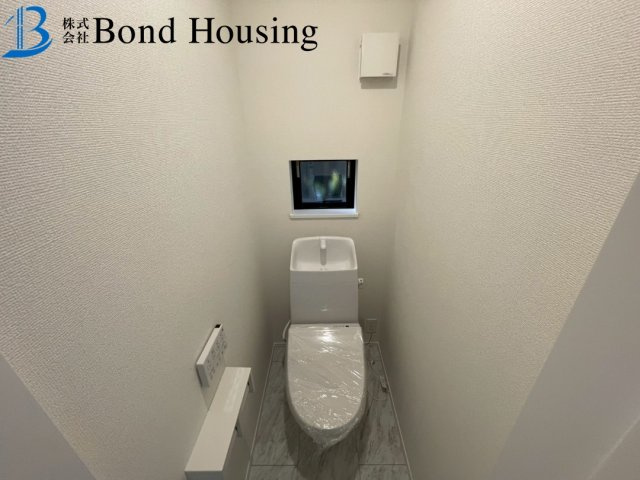 性能評価取得物件　中朝霧丘46全1棟　新築戸建のトイレ