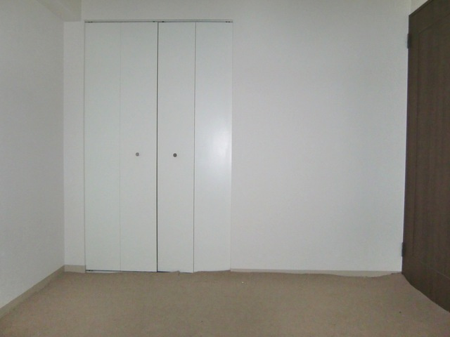 ライオンズマンション灘南の洋室