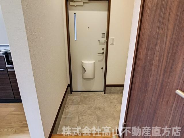 直方市大字頓野のアパートの玄関