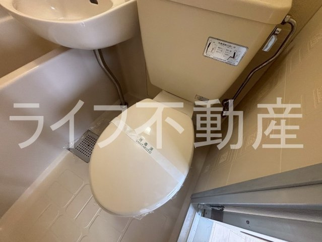 ロイヤル俊徳Ⅱのトイレ|落ち着いた色調のトイレです