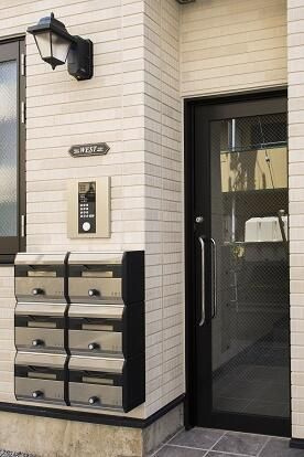 Glanz大島WESTのエントランス