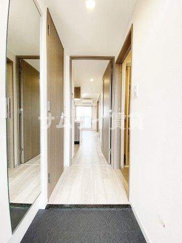 プレサンス鶴舞パークグラッドの玄関