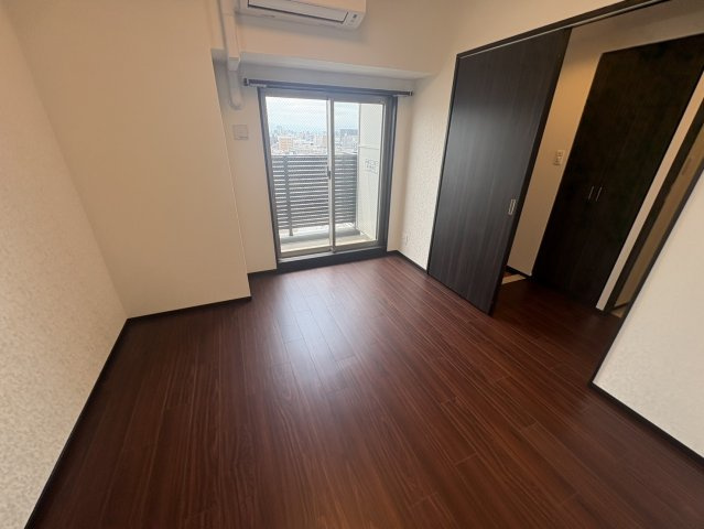 プレジオ森河内ASIANの洋室