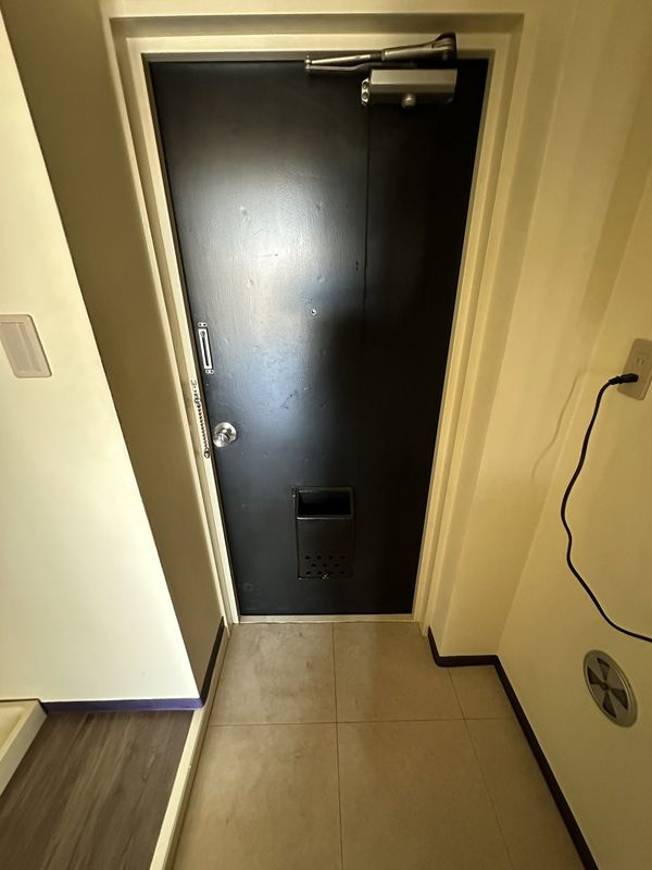 リバーコープ金明の玄関