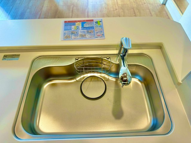 ブルーミングガーデン西原町小那覇・１号棟のキッチン|流し台