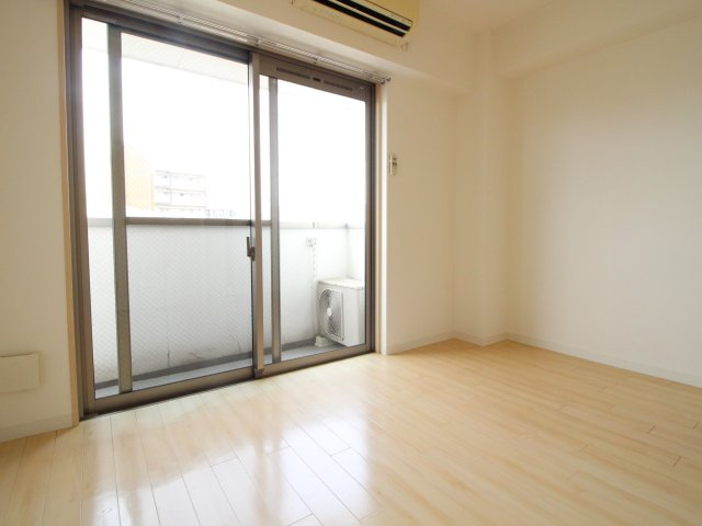 グランエクラ岸里の寝室