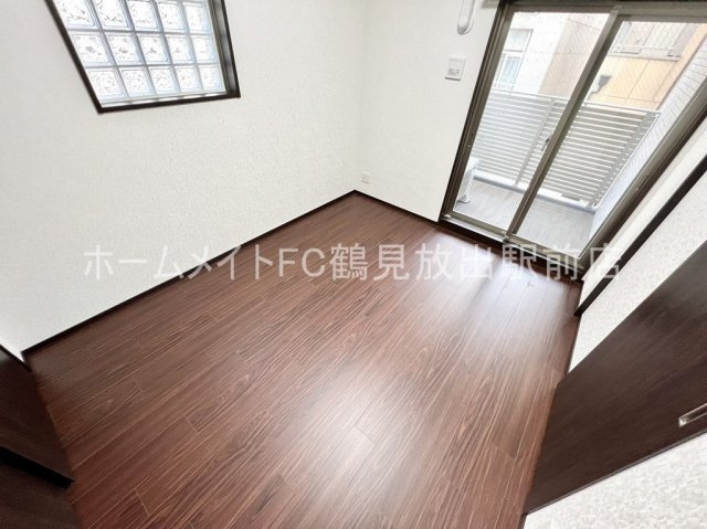 大阪市鶴見区鶴見４丁目の賃貸マンションの洋室