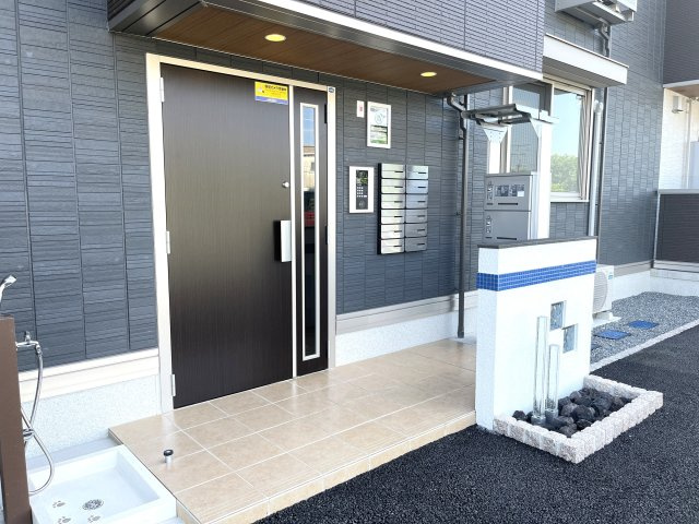 ＷＭ新八代　Ａ棟のエントランス