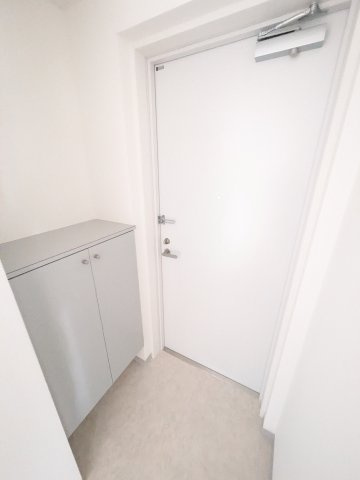 ルミアージュ登戸の玄関