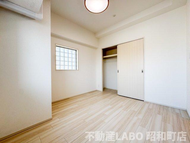 プレジオ帝塚山の寝室