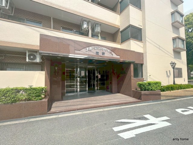 ノルデンハイム豊新 仲介手数料無料のエントランス