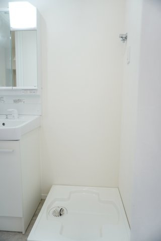 十條草加マンションB棟のランドリースペース