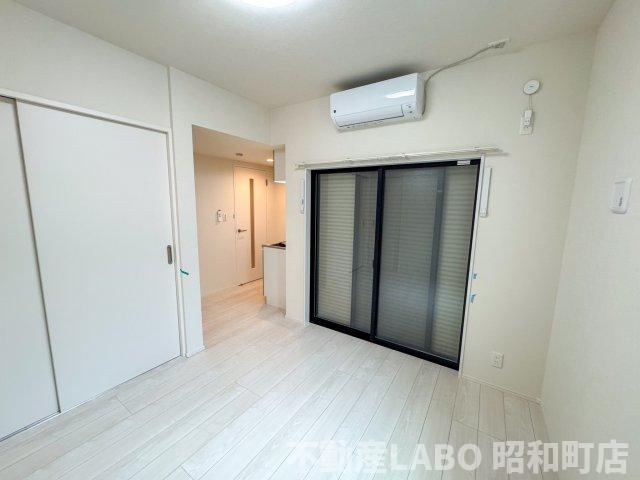 ハーモニーテラス遠里小野Ⅲの居間・リビング