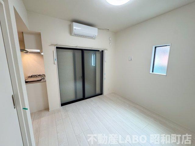 ハーモニーテラス遠里小野Ⅲの洋室