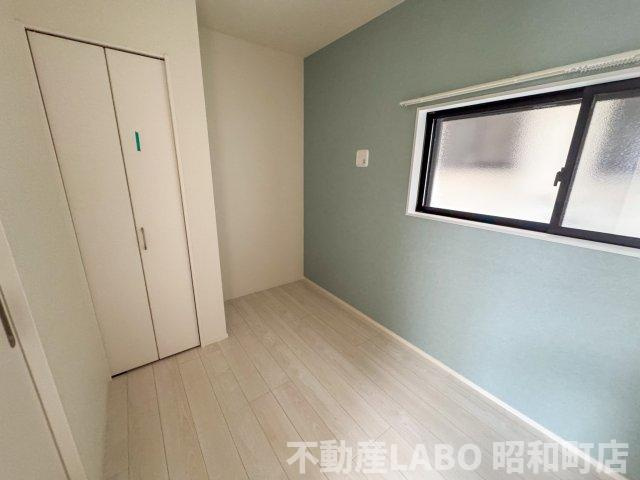 ハーモニーテラス遠里小野Ⅲの寝室