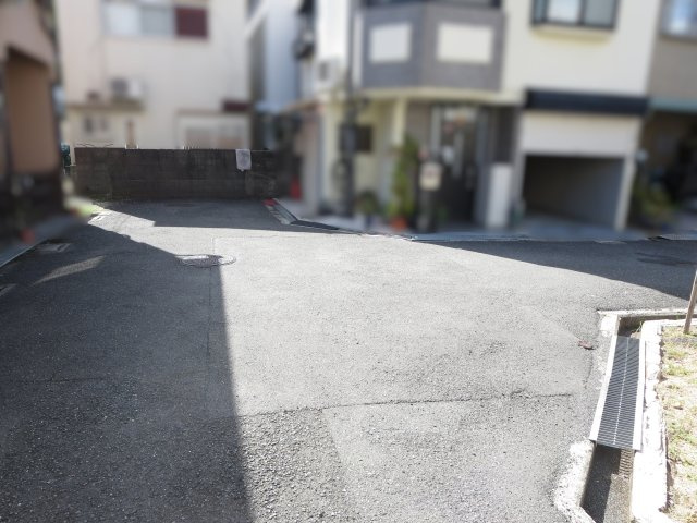売土地　四條畷市蔀屋本町（建築条件無し更地）の前面道路含む現地写真