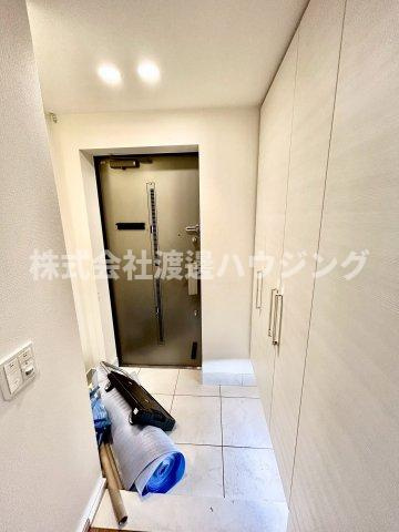 プラウド新千里西町の玄関