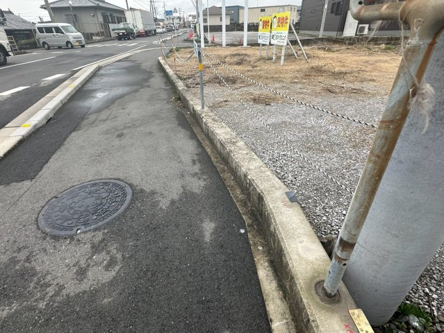 豊岡町長田　売土地の前面道路含む現地写真