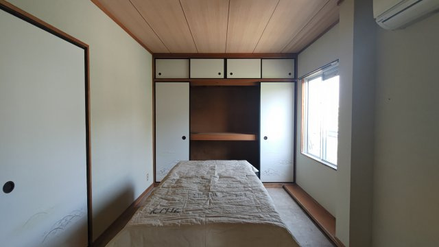 川添ロイヤルハイツの寝室