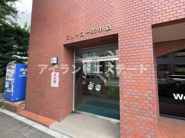 ニューコーポ中島　バイク相談　南面2室　角部屋のエントランス