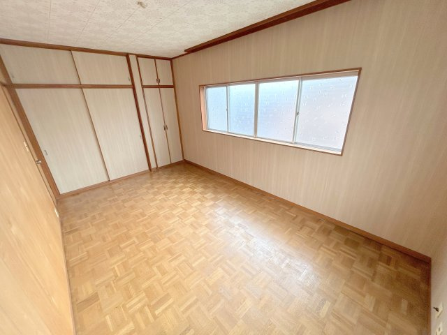 北信貴ケ丘2丁目貸家の洋室