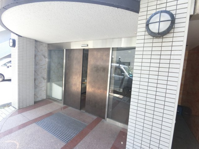 サントミグランドールマンションのエントランス