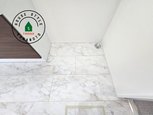 熊本市西区中原町第1-4棟（1号棟）の内観：施工例|ランドリースペースとなります。広々して有効的にご使用できます。 