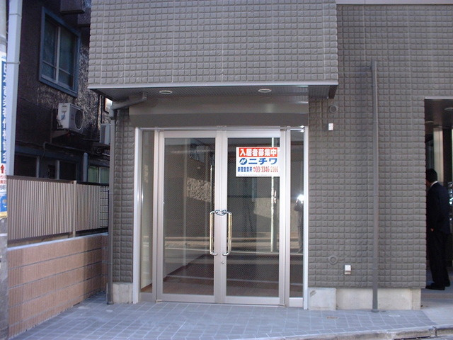 フラット・ミタニのエントランス