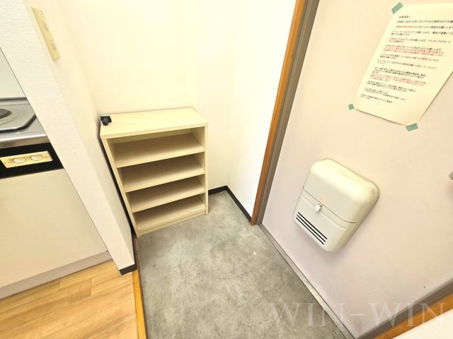 プチメゾン井原の玄関