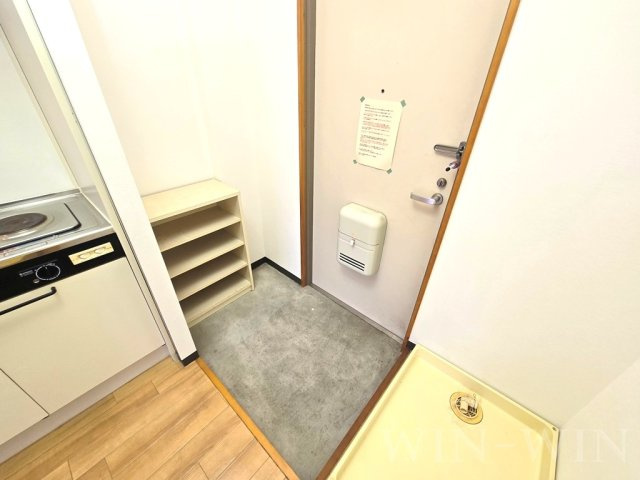 プチメゾン井原の玄関