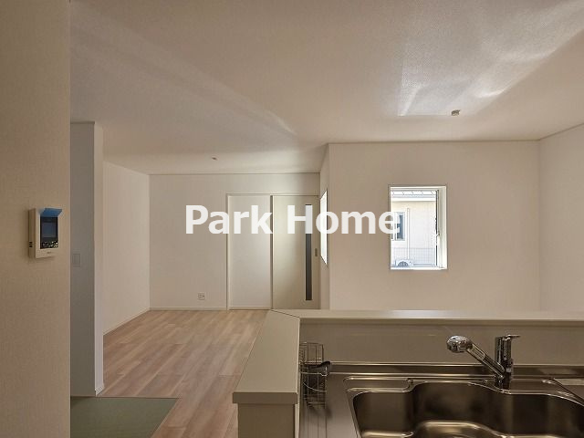 高知市薊野南町 -１号棟-新築戸建ての居間・リビング