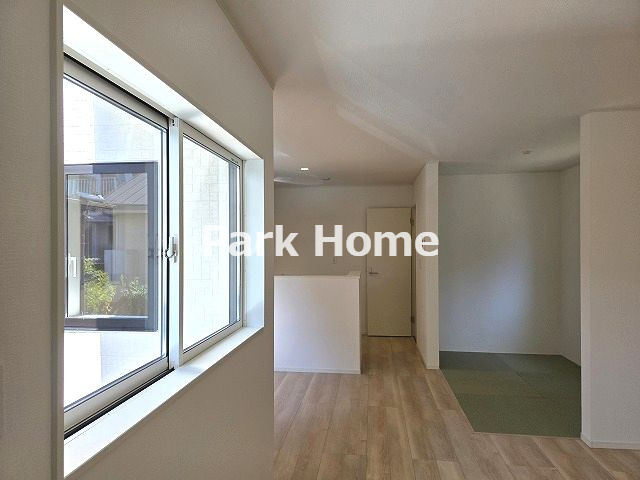 高知市薊野南町 -１号棟-新築戸建ての居間・リビング|１F:18.3LDK（畳コーナー含む）