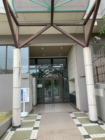 サンシティ朝霧のエントランス