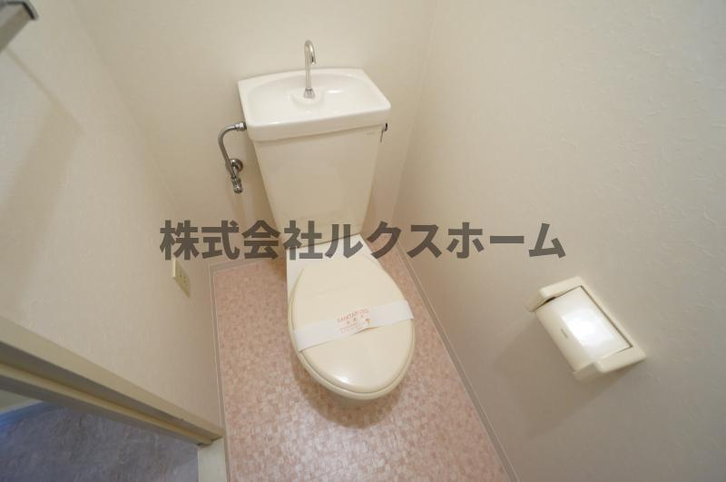 グランディール茨木のトイレ|落ち着いた色調のトイレです