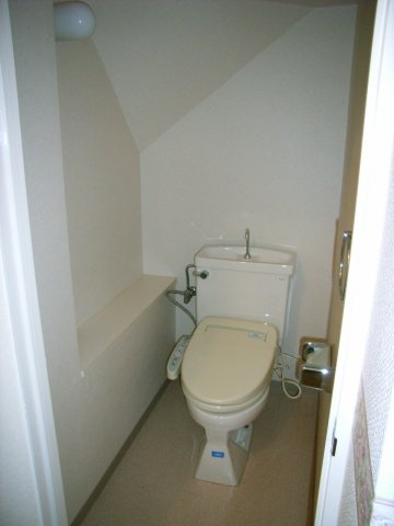 神戸市北区緑町７丁目の賃貸マンションのトイレ