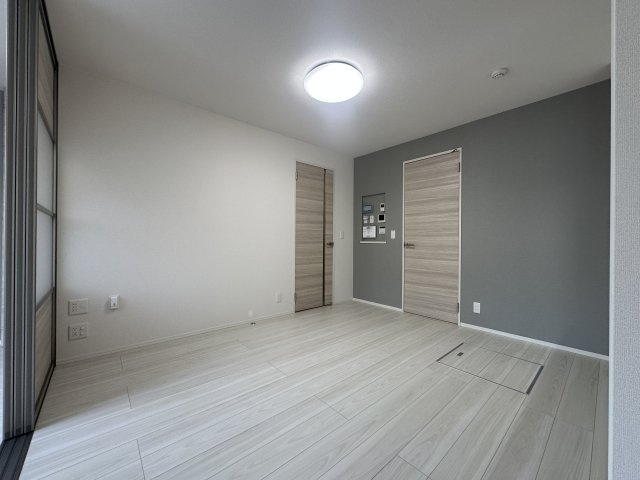 川崎市多摩区宿河原７丁目のアパートの居間・リビング