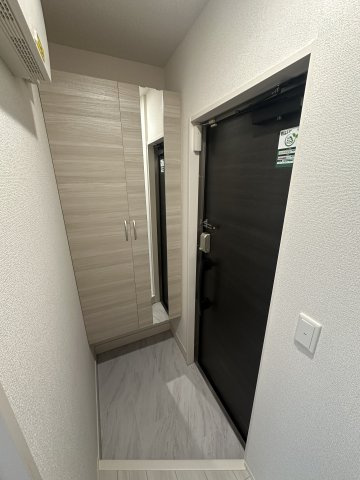 川崎市多摩区宿河原７丁目のアパートの玄関