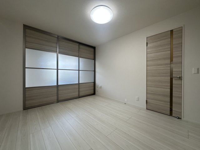 川崎市多摩区宿河原７丁目のアパートの居間・リビング