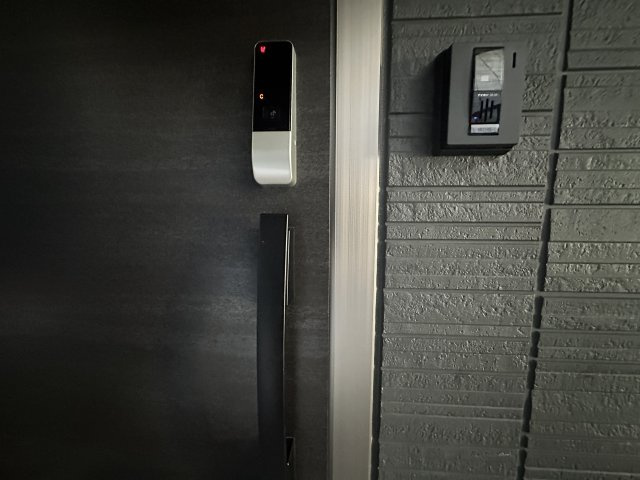 川崎市多摩区宿河原７丁目のアパートの玄関