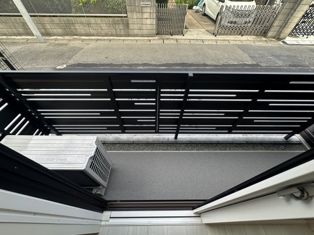 川崎市多摩区宿河原７丁目のアパートのバルコニー