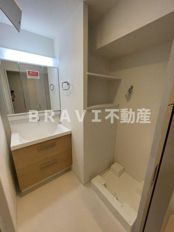 グランパール森ノ宮 BRAVI不動産の洗面所
