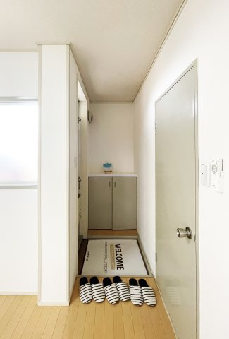 コーポ佐野　北棟の玄関