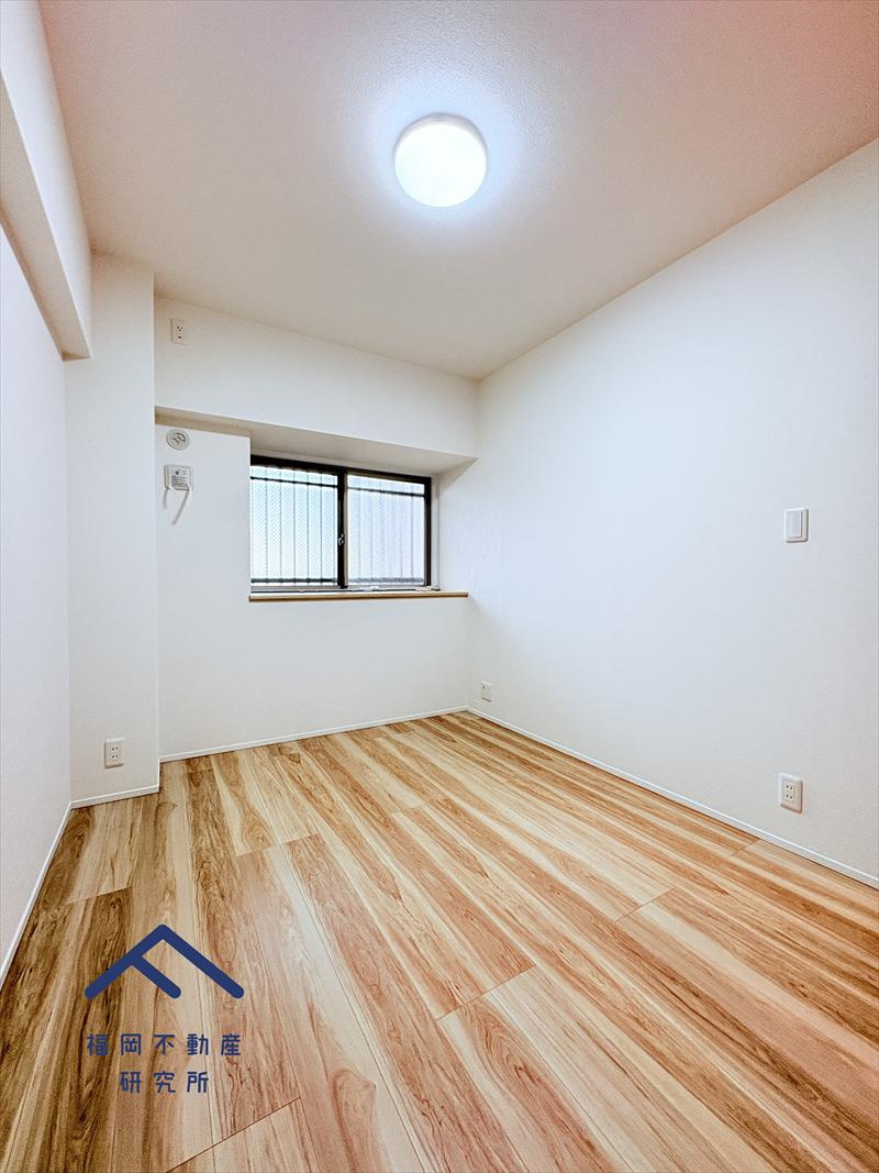 アーバンパレス春日一の谷LAKE AVENUEの洋室