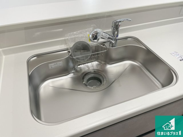 茨木市鮎川　新築一戸建ての設備|蛇口の先端に浄水器を内蔵しています！原水と浄水、お湯と冷水、シャワーの切替えがワンタッチなので用途によって使い分けられます。